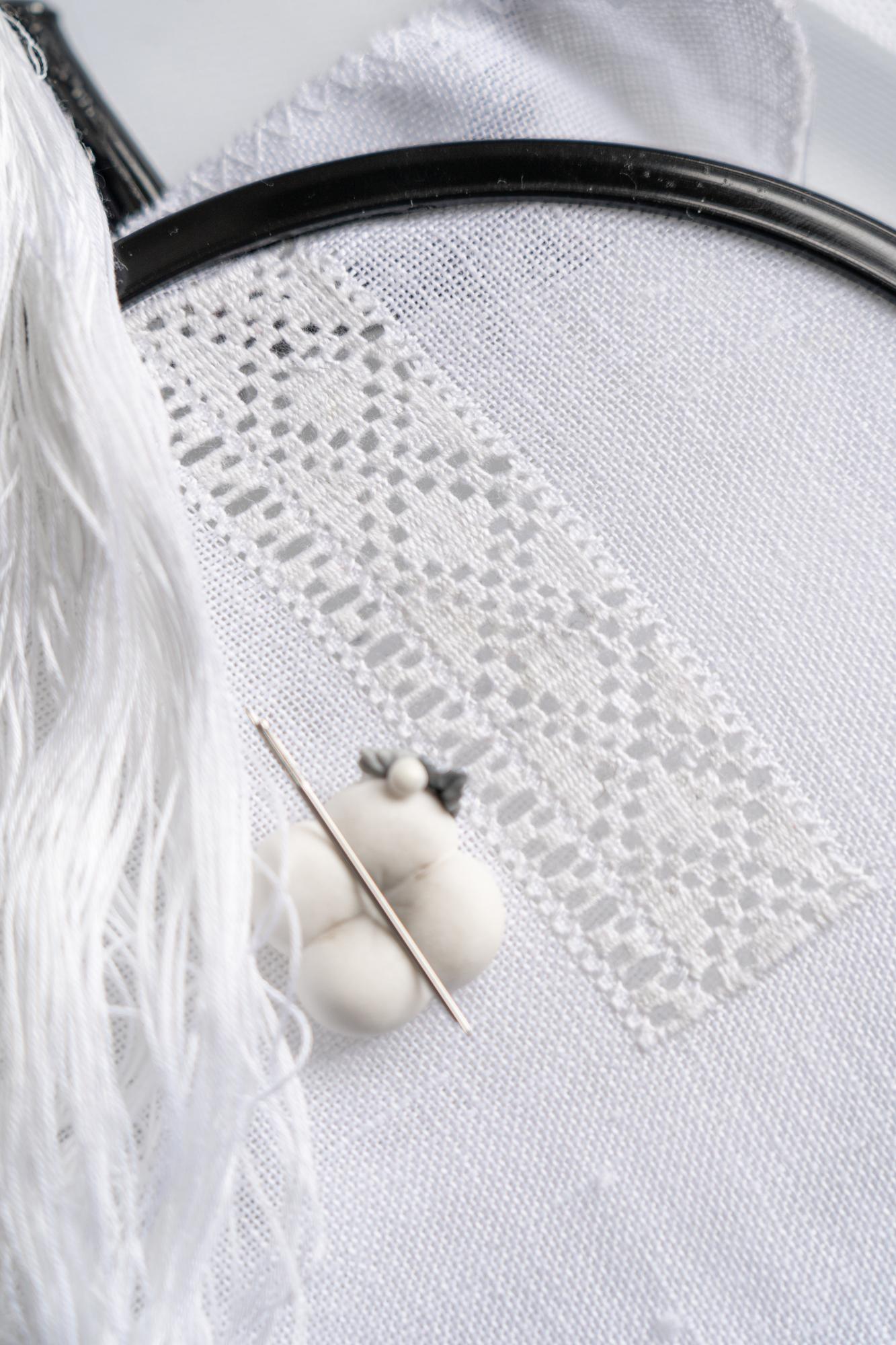 embroidered linen with floral pattern on table