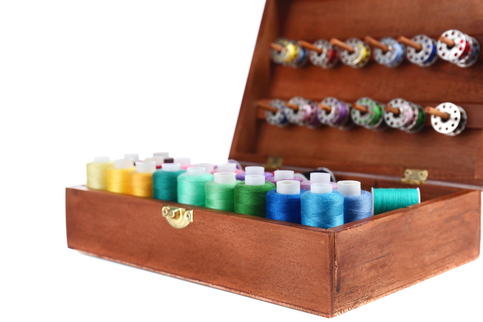 assortment of embroidery kits and finished goods